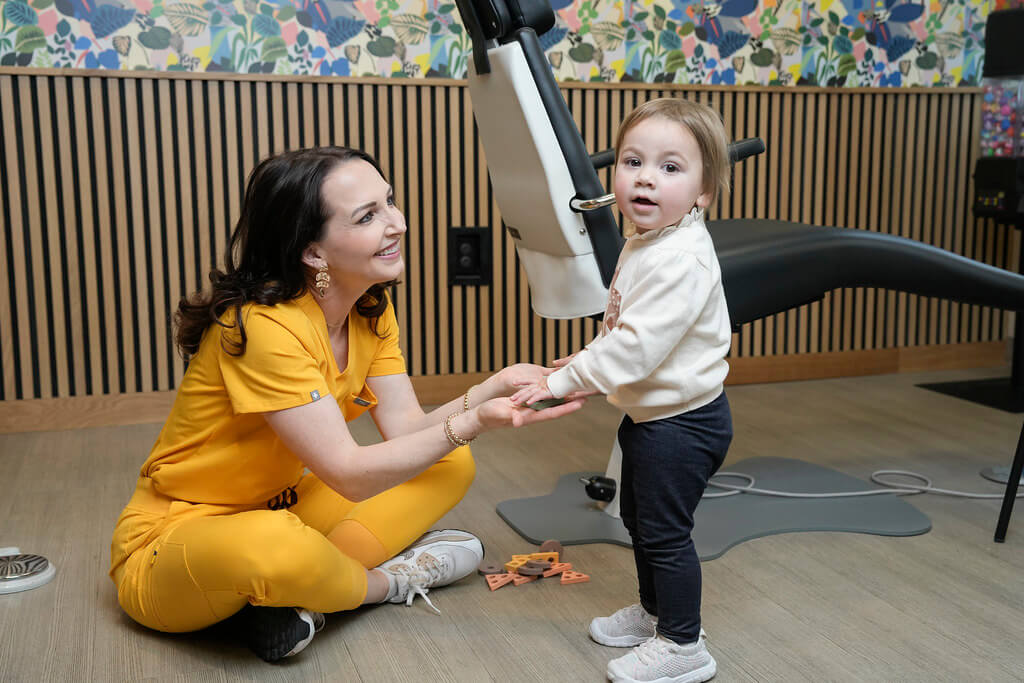 Dr Juntgen with young toddler patient