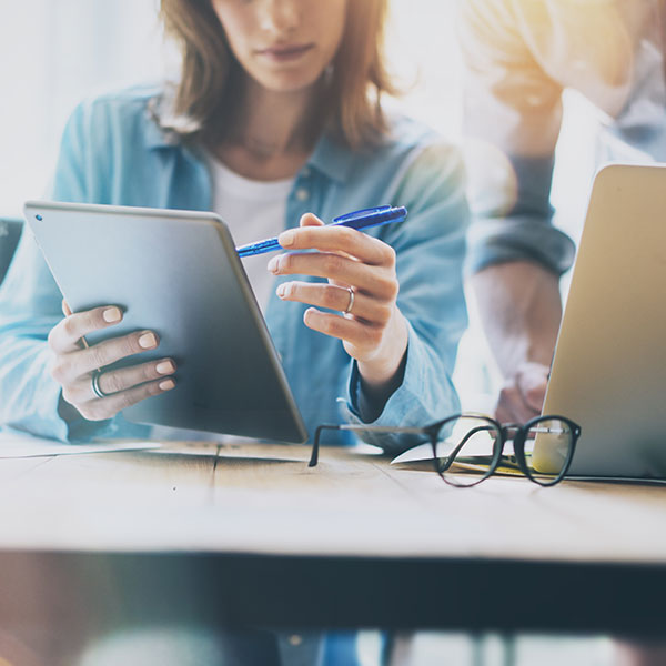 Marketing professional working on tablet