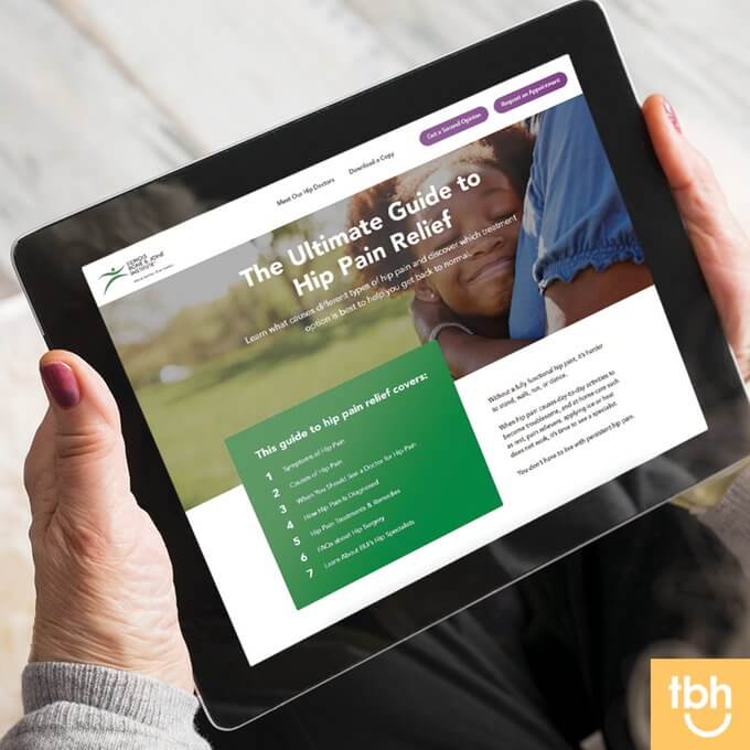 elderly woman navigates healthcare website
